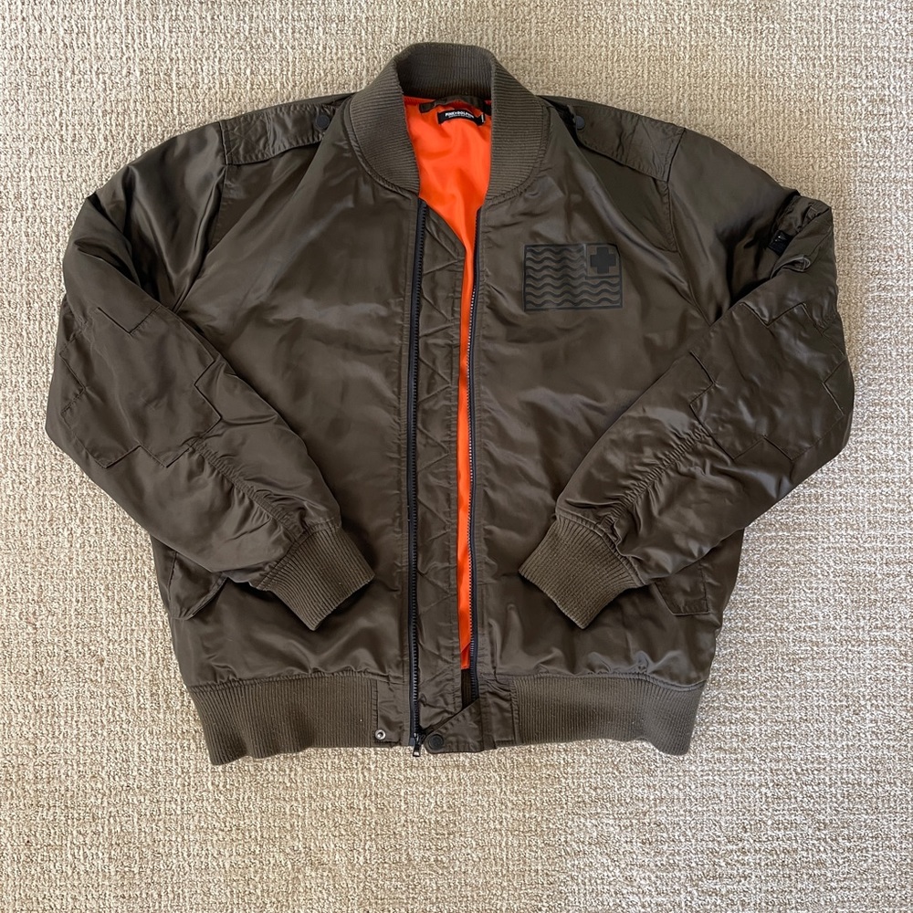 cool pink + dolphin olive bomber jacket with cross details! size men’s xlarge